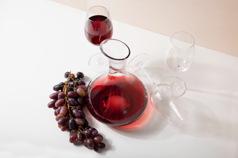 Red Wine with Grapes A carafe and glass of red wine with grapes